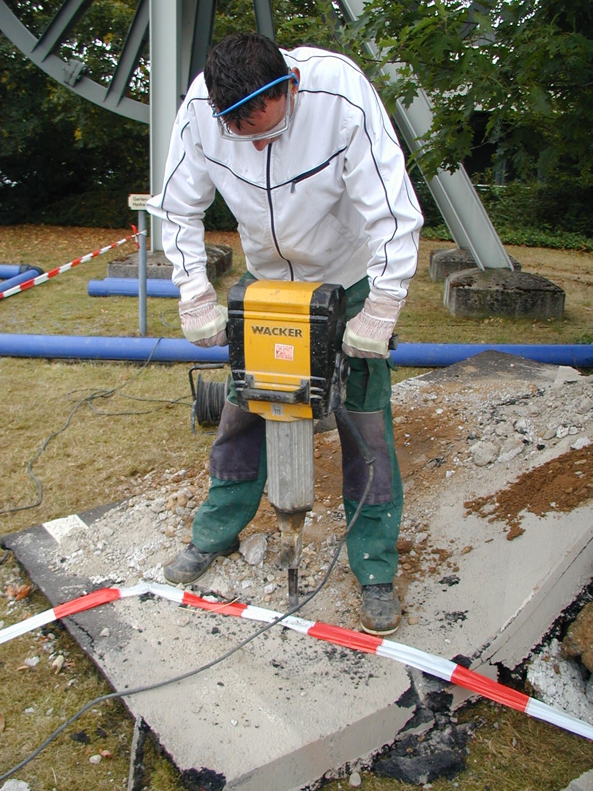 Test person working with a demolition hammer