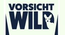 Ausschnitt eines Plakats mit der Aufschrift: Vorsicht Wild!